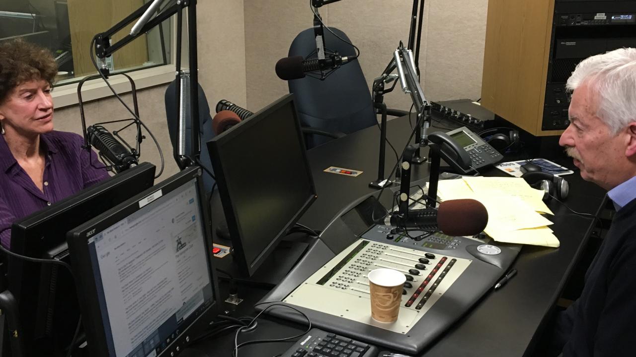 Peggy Dulany and Denver Frederick in a radio studio